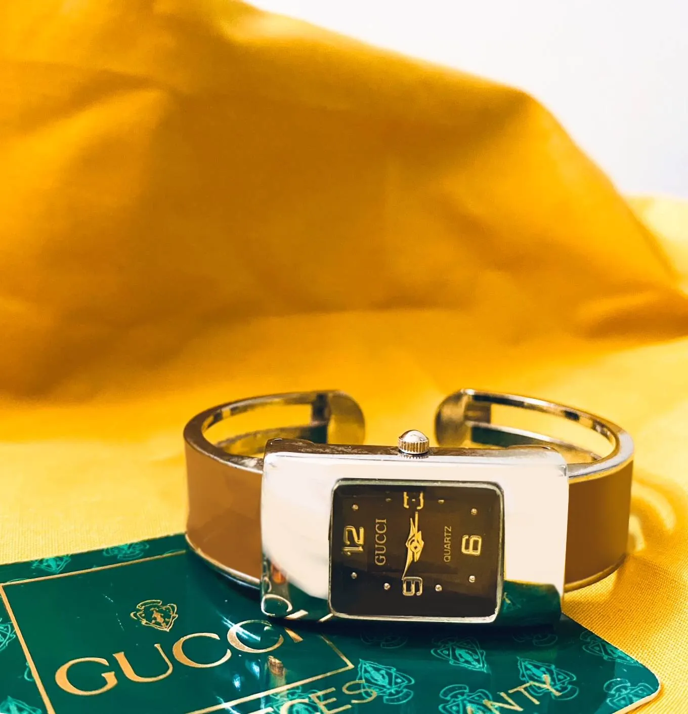 1990S GUCCI QUARTZ LACQUERED BANGLE WATCH