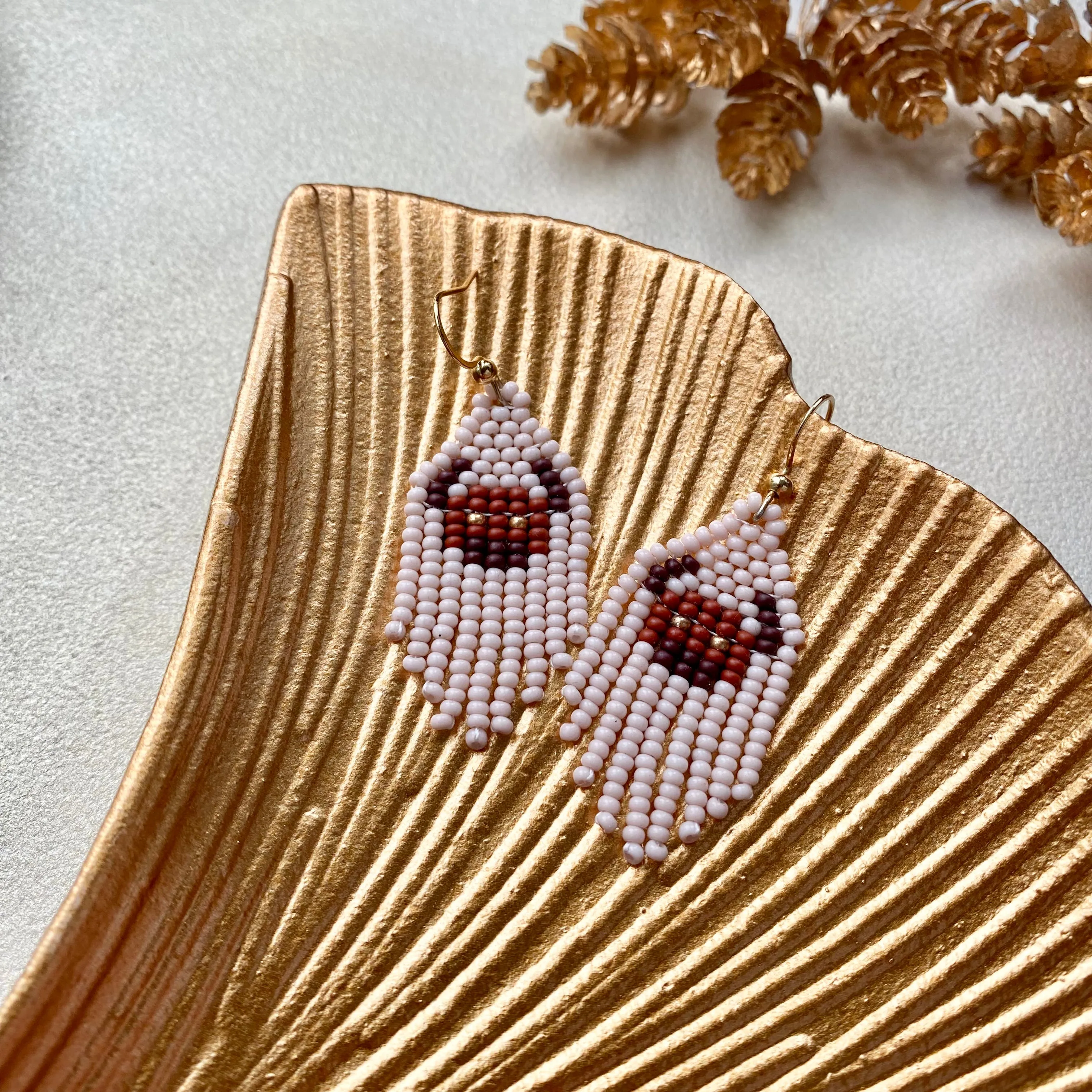 Cowgirl Earrings. Seed Bead Bull Earring for Women. Small Fringe Western earrings. Short Chandelier Earrings in boho hippie style.
