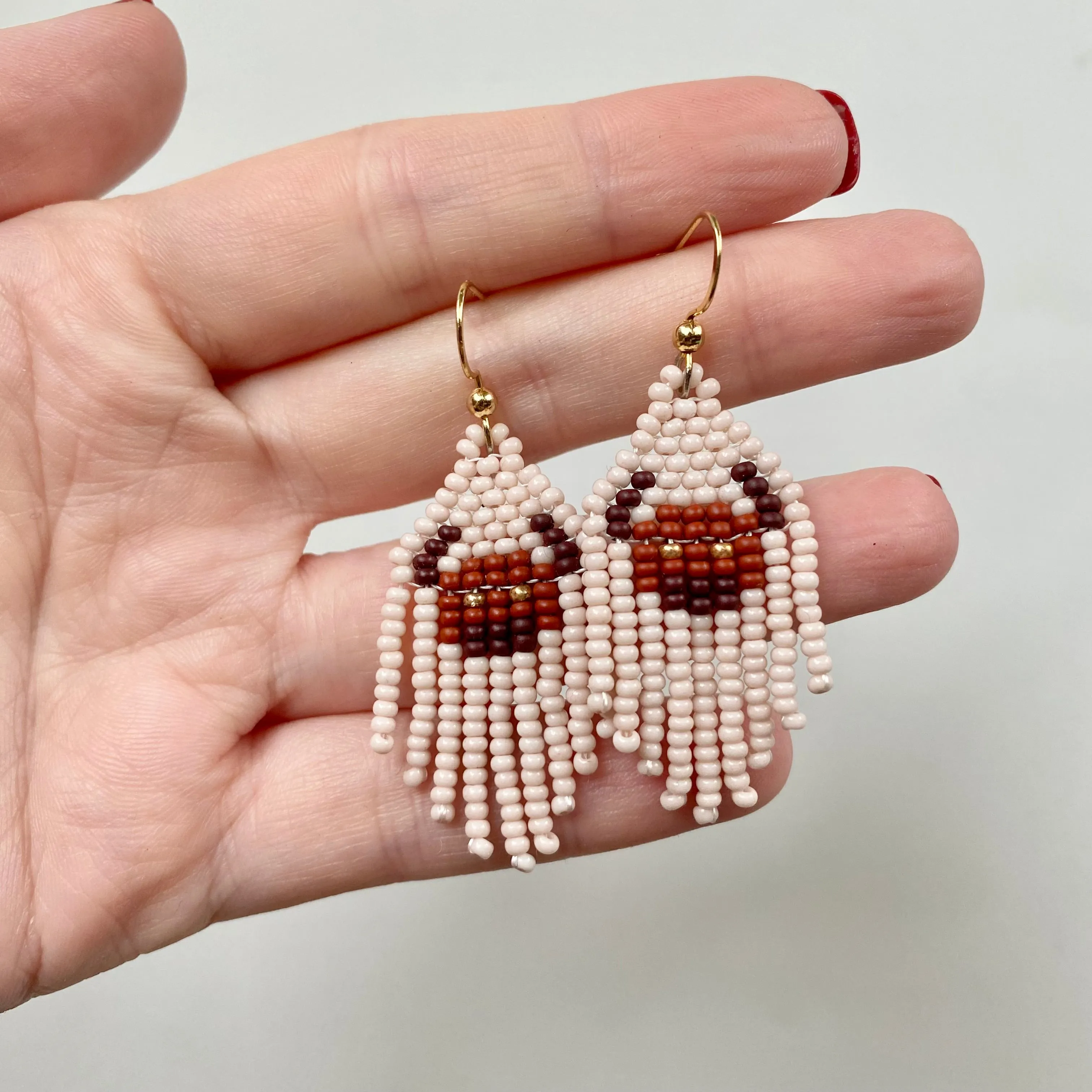 Cowgirl Earrings. Seed Bead Bull Earring for Women. Small Fringe Western earrings. Short Chandelier Earrings in boho hippie style.