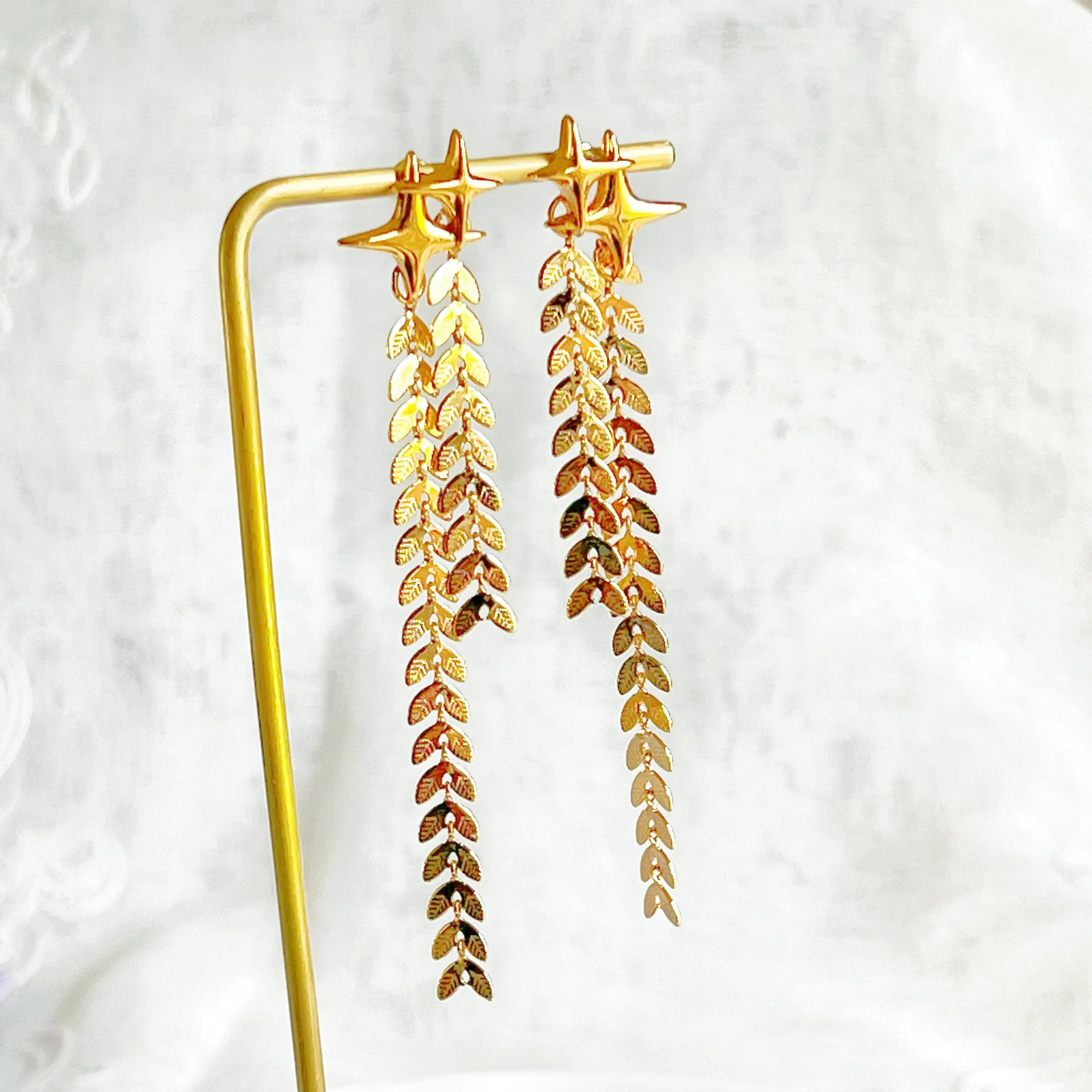 Ninaouity Shining Star Drop Earrings