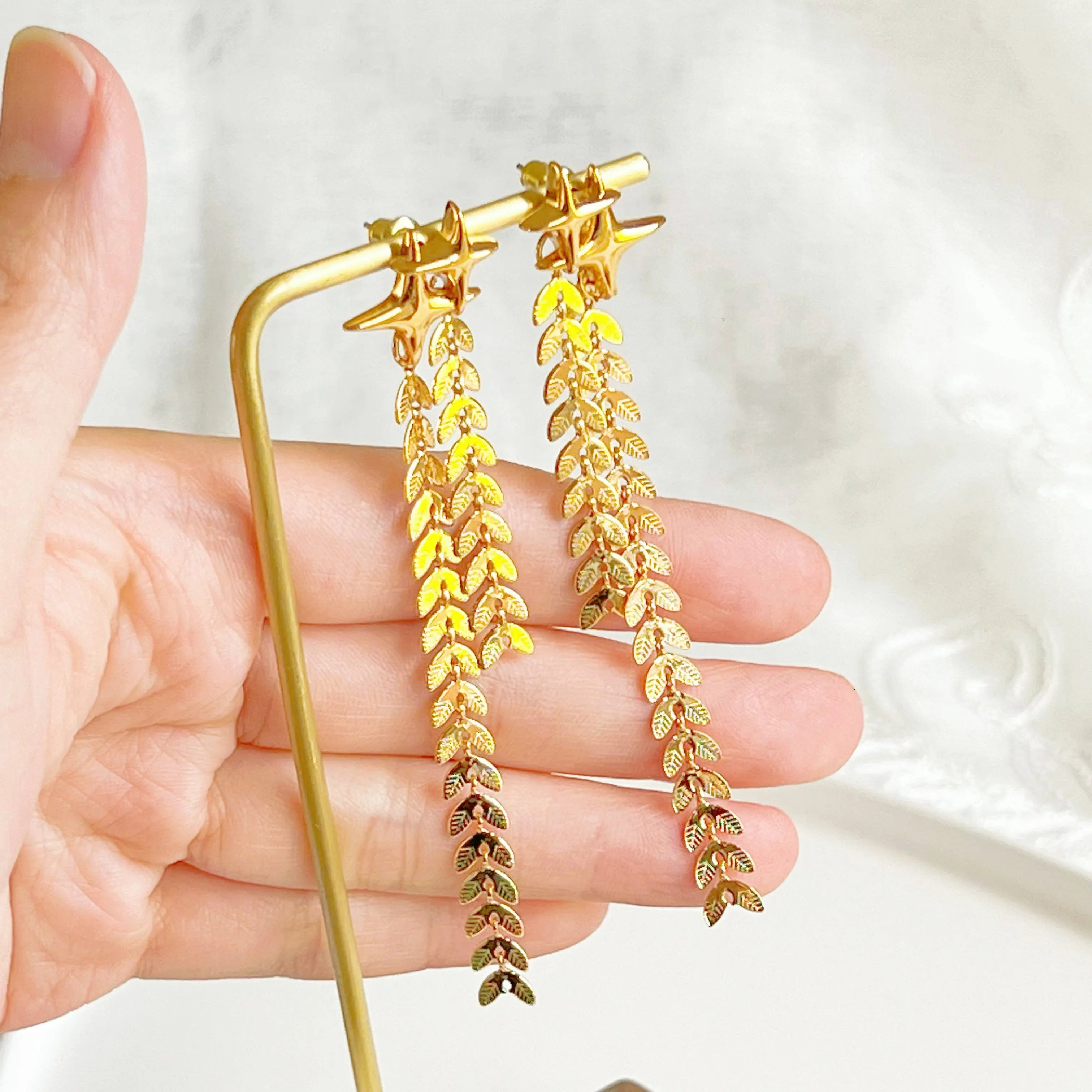 Ninaouity Shining Star Drop Earrings