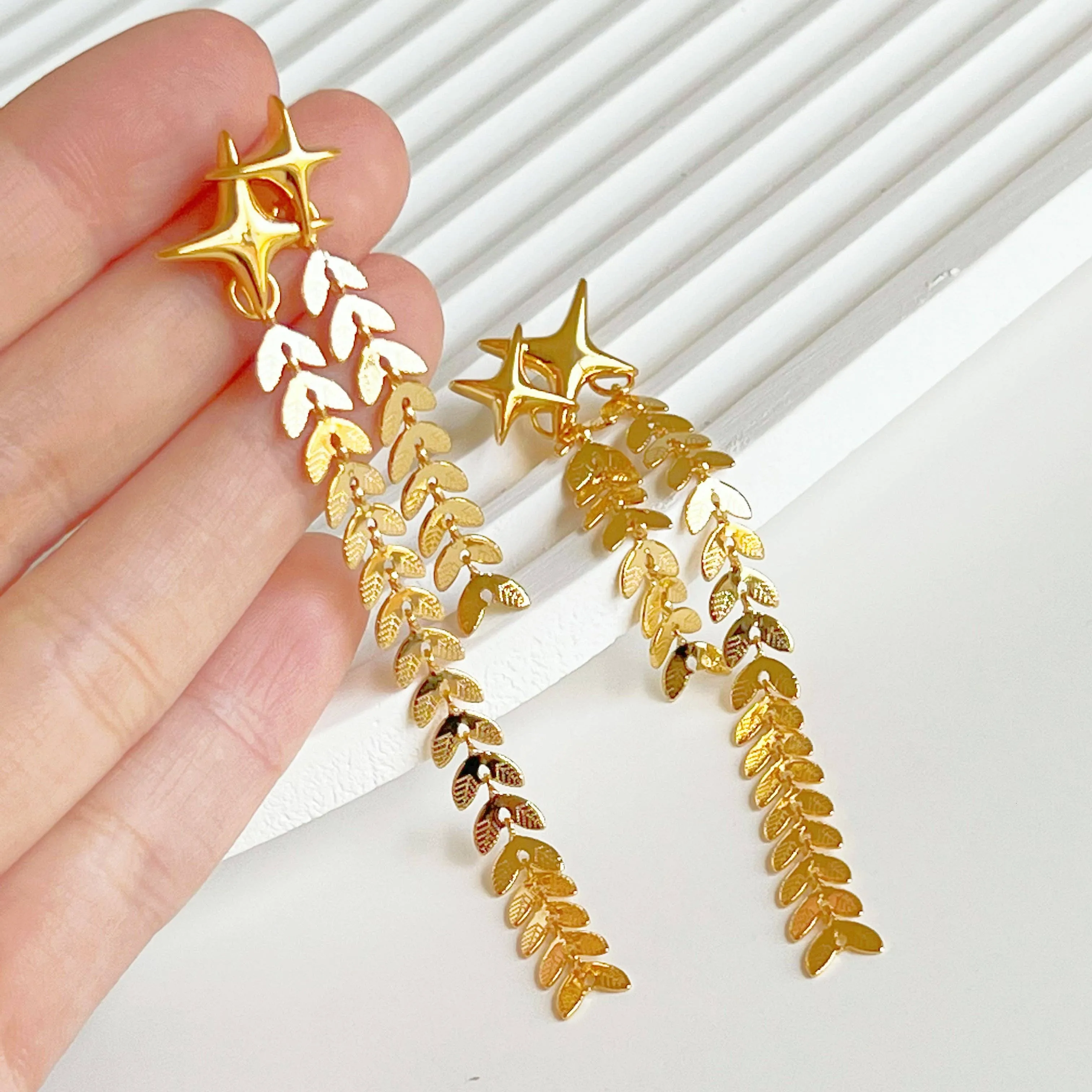 Ninaouity Shining Star Drop Earrings
