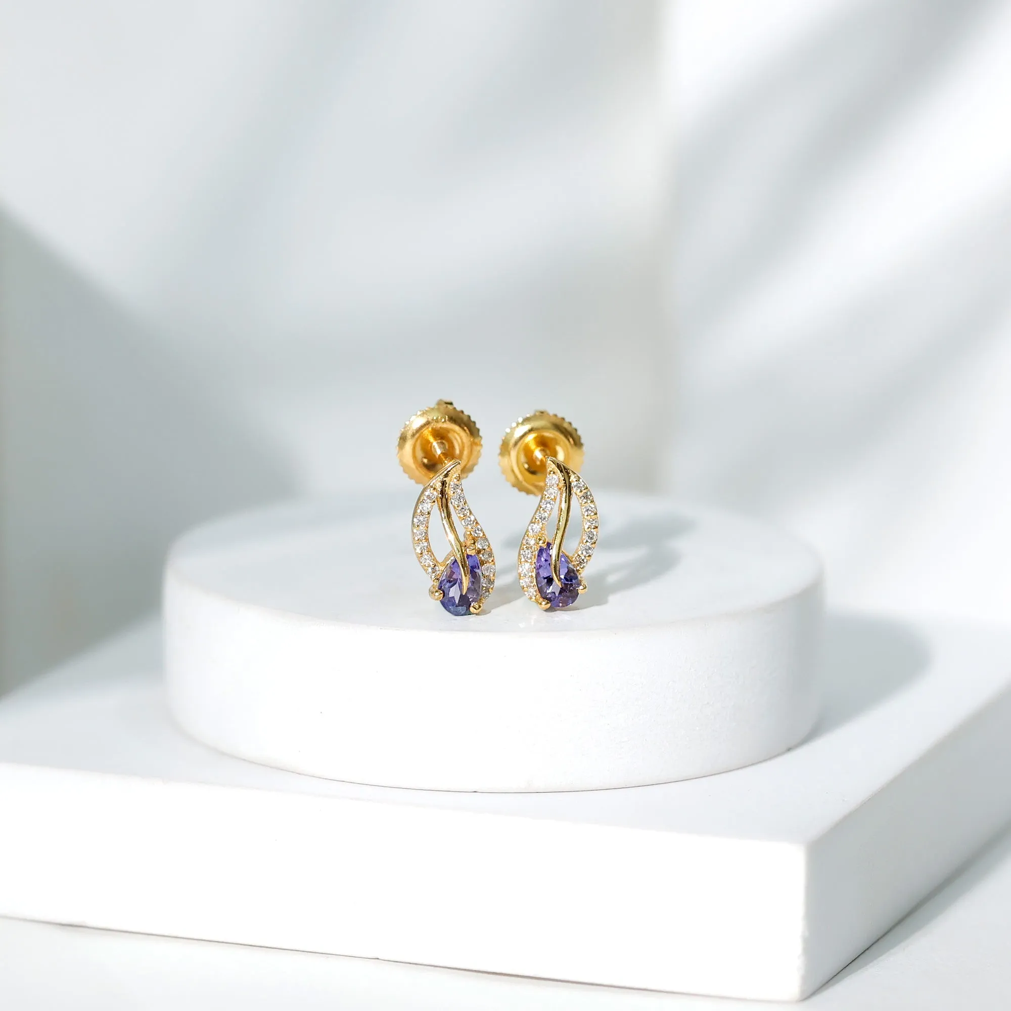 Pear Shape Tanzanite and Diamond Leaf Stud Earrings